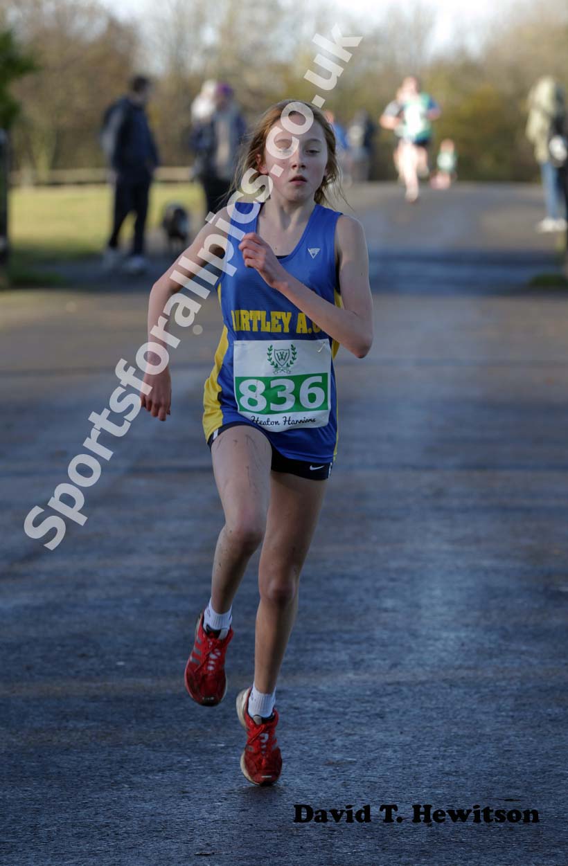 Sophie Burnett  wins the under-15s Heaton Memorial Road Race.